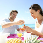 Couple enjoying breakfast in resort