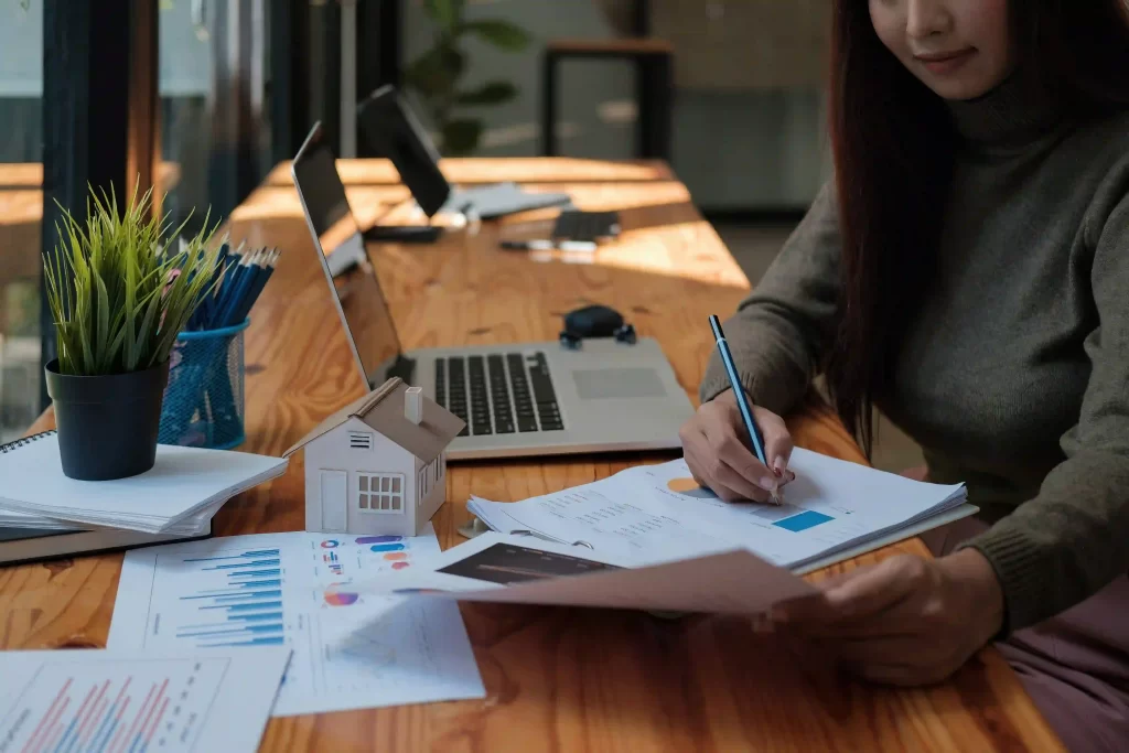 Tax expert analyzing financial documents for resolution.